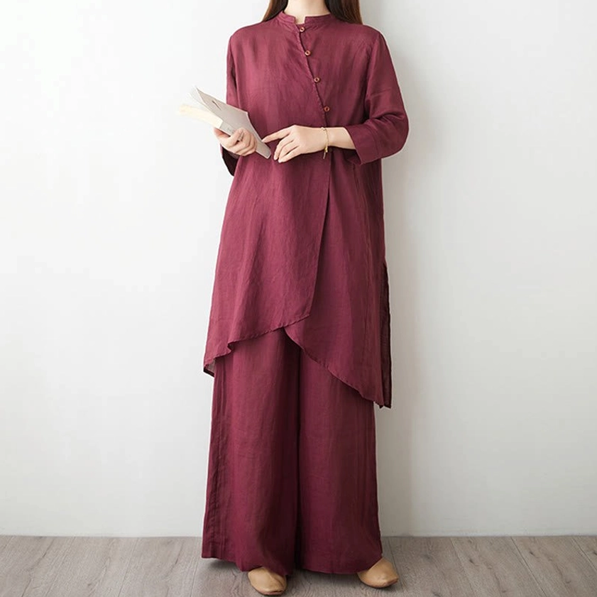 Zen style women's meditation suit front side view showing asymmetrical long top and natural linen drape