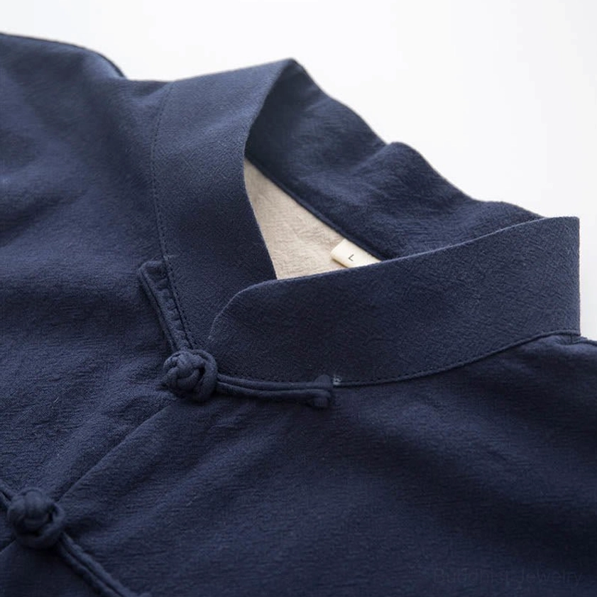 Handcrafted quality detail of zen tang suit showing fine stitching and natural linen construction for spiritual wear