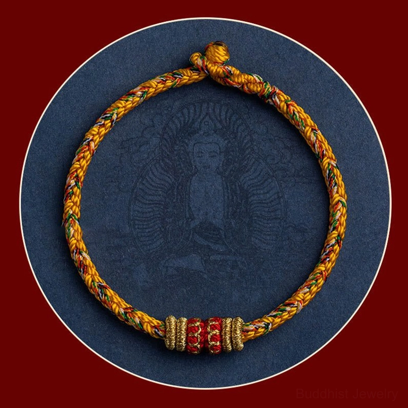 Handmade zodiac animal natal buddha bracelet showing craftsmanship and spiritual intention