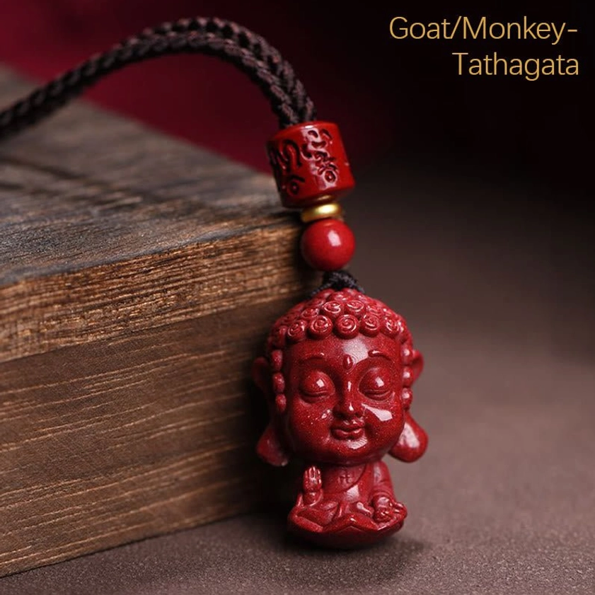 Goat/Monkey Tathagata zodiac natal Buddha cinnabar pendant front view