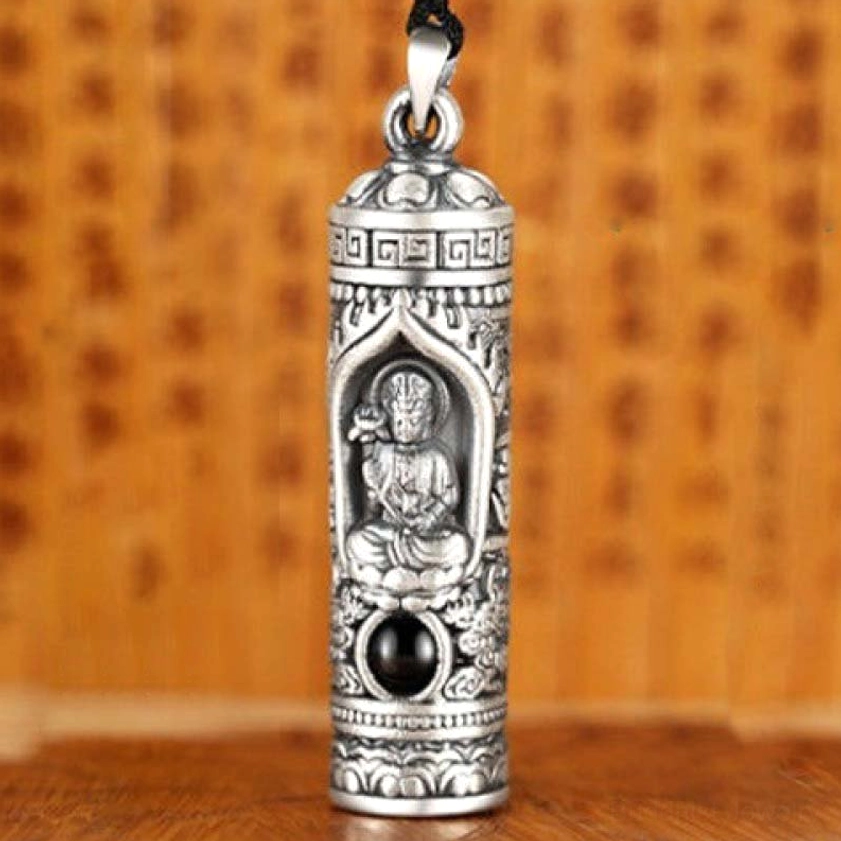 Guardian Buddha zodiac pendant lifestyle photo showing wearable size and artistic embossment detail