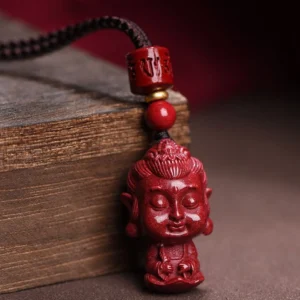 Ox/Tiger Void Bodhisattva cinnabar natal Buddha pendant necklace close-up front view