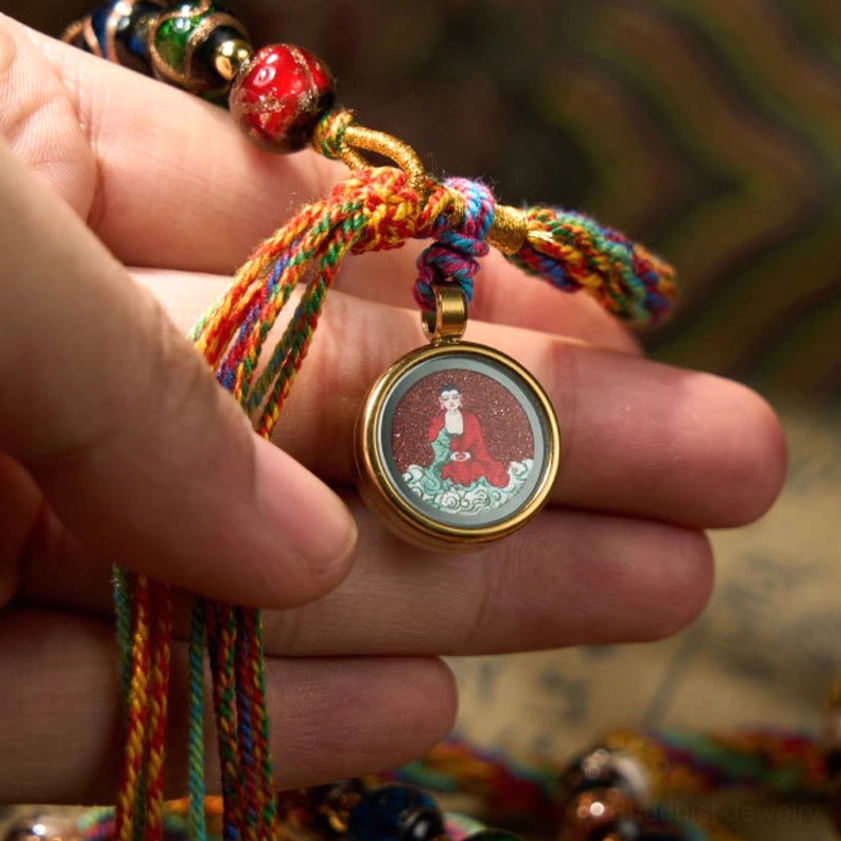 Zodiac natal Buddha cinnabar bracelet artistic flat-lay arrangement showing bracelet design with all materials and Buddhist spiritual symbolism