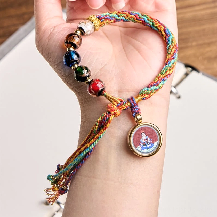 Handmade zodiac natal Buddha bracelet artisan craftsmanship detail showing individual bead selection, hand-dyed silk string, and authentic material variations